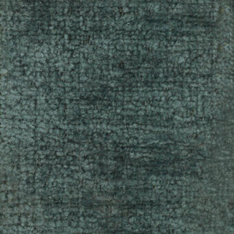 Teal-gray looped pile fabric texture with nubby surface, uniform weave, and printed text “turri > fabric cat. b > 778 e” along the bottom edge.